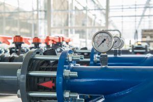Row,Of,Plastic,Pipes,With,Water,Pressure,Sensors