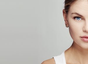 Beauty,Portrait,Of,Young,Female,Face,With,Net.,Anti,Aging,